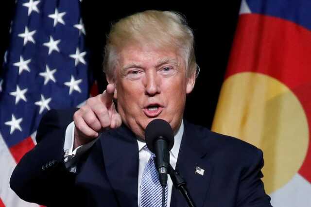 Republican presidential nominee donald trump points at the media as he speaks at a campaign rally in colorado springs