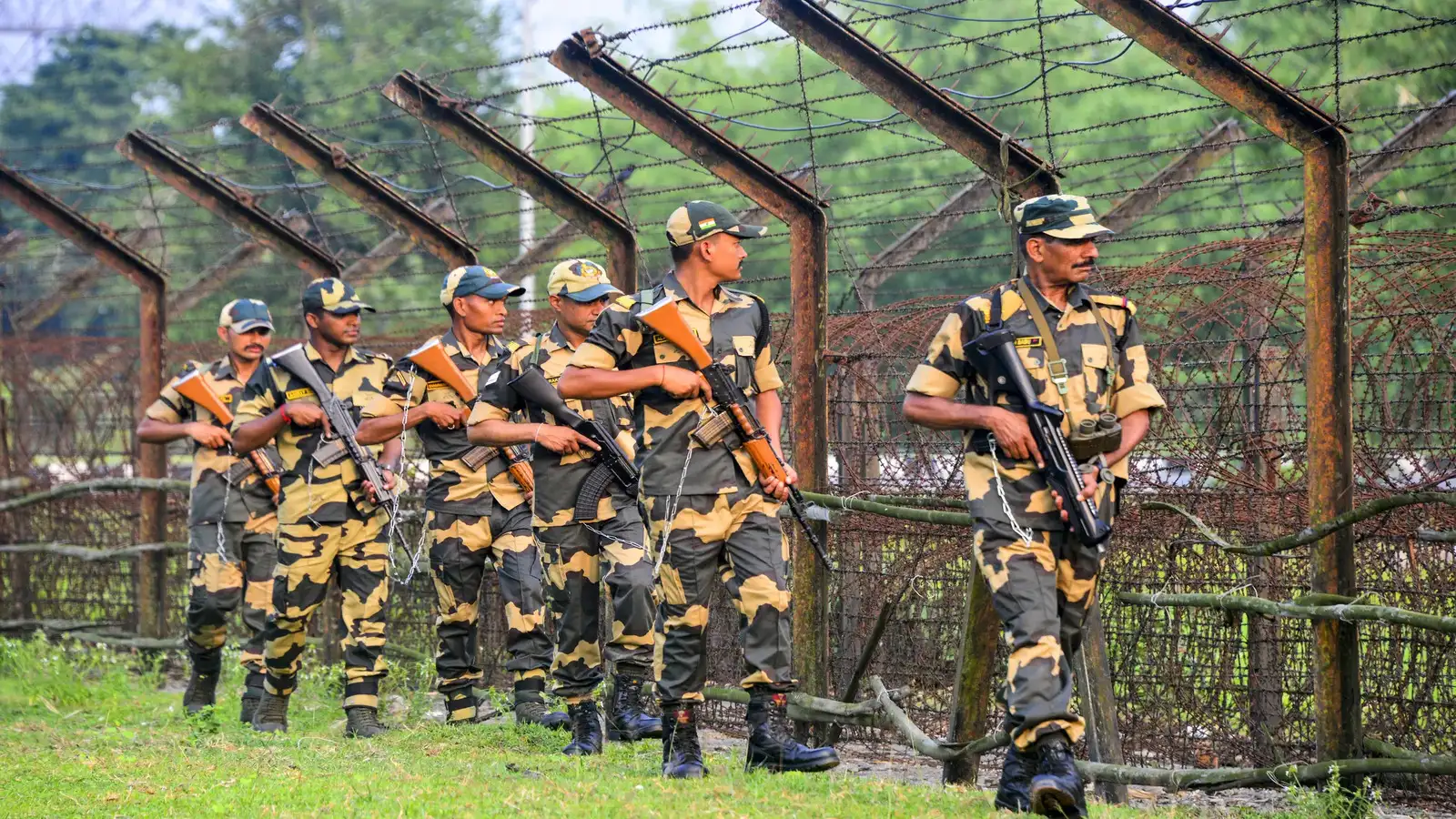 Border security force bsf personnel patrol along the india banglades